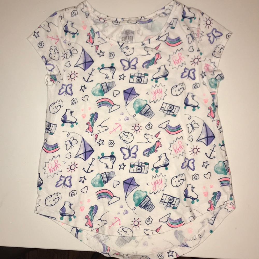 White tee with color on it.